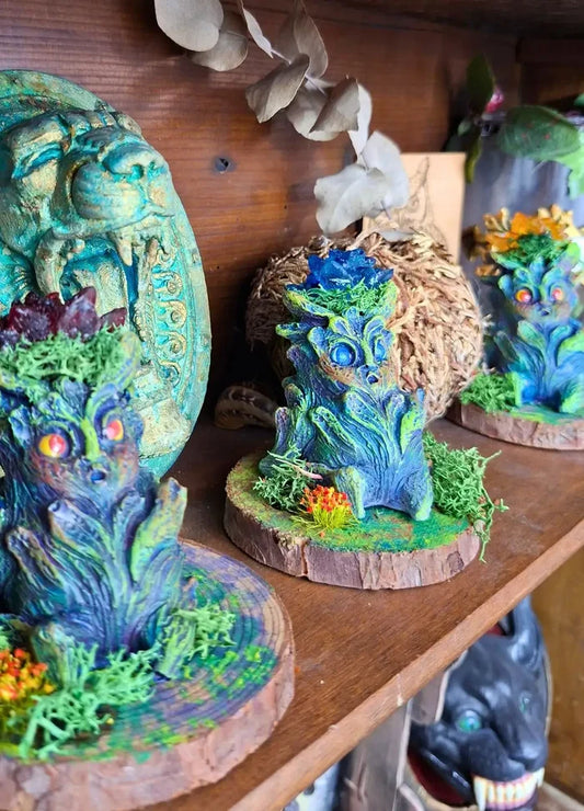 Handmade Lumen Mandrake fantasy plant collectible sculpture displayed on a wooden base.