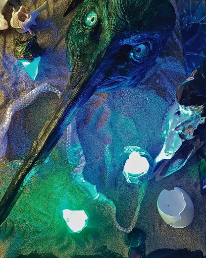 Mystical Thoth mask in resin with a luminous blue crystal. Part of the Wunderkammer Collection, inspired by ancient Egyptian gods and myths.